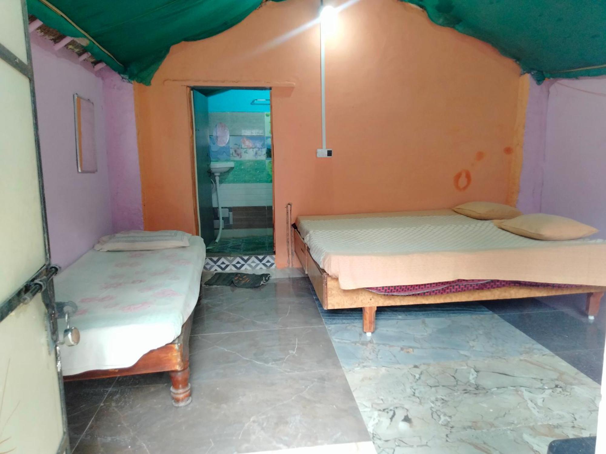 Goldengarden Cottages Hampi Quarto foto